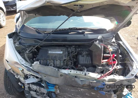 2010 Honda Insight Ex z USA, uszkodzony, nr VIN JHMZE2H77AS037072